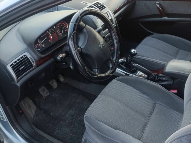 Синий Пежо 407, объемом двигателя 2 л и пробегом 300 тыс. км за 4300 $, фото 6 на Automoto.ua