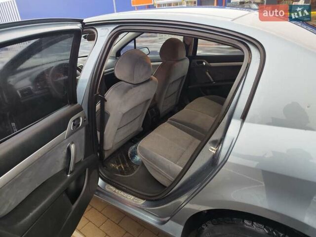 Синій Пежо 407, об'ємом двигуна 2 л та пробігом 255 тис. км за 3850 $, фото 12 на Automoto.ua