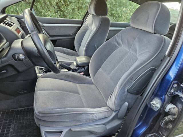 Синий Пежо 407, объемом двигателя 1.6 л и пробегом 300 тыс. км за 2000 $, фото 10 на Automoto.ua