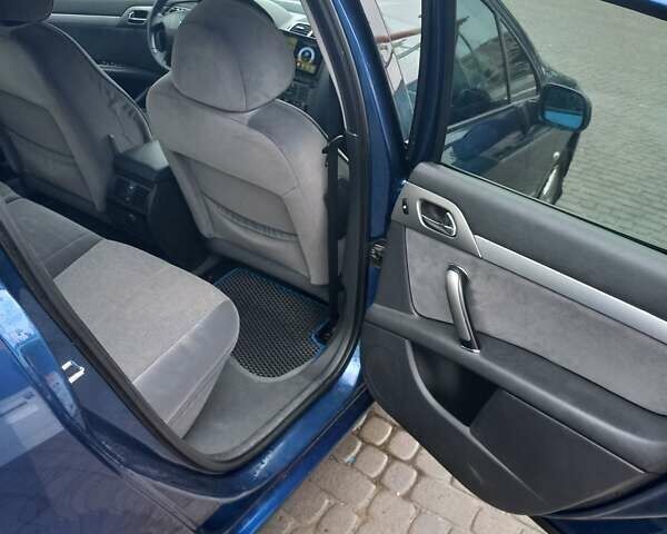 Синий Пежо 407, объемом двигателя 1.6 л и пробегом 230 тыс. км за 5800 $, фото 16 на Automoto.ua