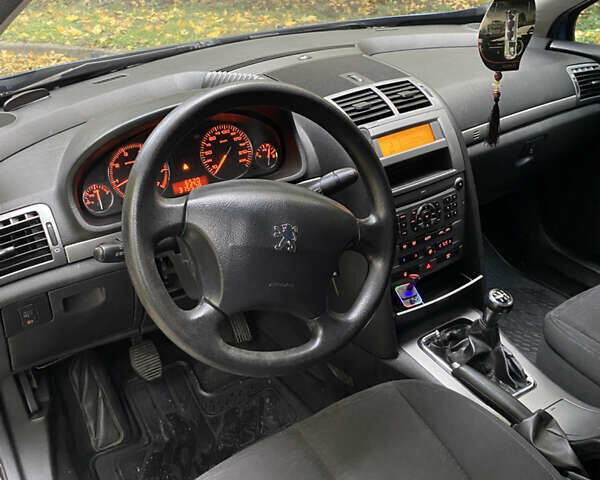 Синий Пежо 407, объемом двигателя 1.8 л и пробегом 315 тыс. км за 4100 $, фото 17 на Automoto.ua