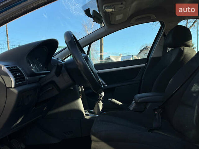 Синий Пежо 407, объемом двигателя 2 л и пробегом 255 тыс. км за 5200 $, фото 8 на Automoto.ua
