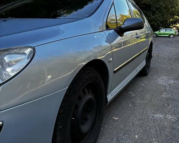 Синий Пежо 407, объемом двигателя 2 л и пробегом 268 тыс. км за 2326 $, фото 6 на Automoto.ua