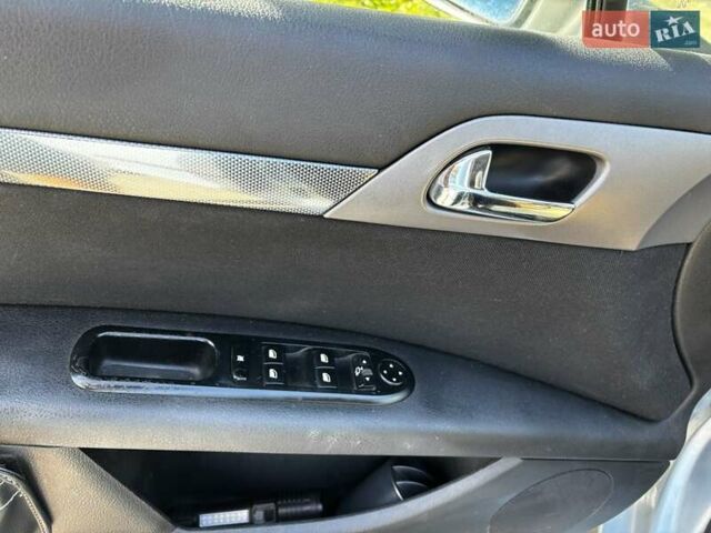 Синий Пежо 407, объемом двигателя 2 л и пробегом 268 тыс. км за 2326 $, фото 12 на Automoto.ua