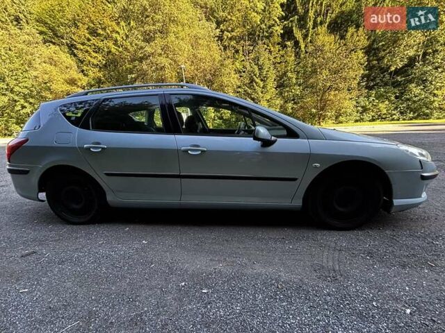 Синий Пежо 407, объемом двигателя 2 л и пробегом 268 тыс. км за 2326 $, фото 1 на Automoto.ua