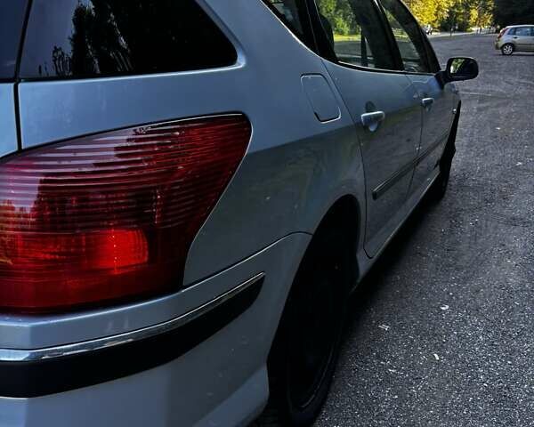 Синий Пежо 407, объемом двигателя 2 л и пробегом 268 тыс. км за 2326 $, фото 4 на Automoto.ua