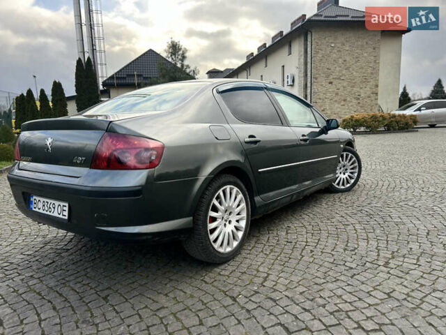 Зелений Пежо 407, об'ємом двигуна 2.7 л та пробігом 285 тис. км за 3950 $, фото 5 на Automoto.ua