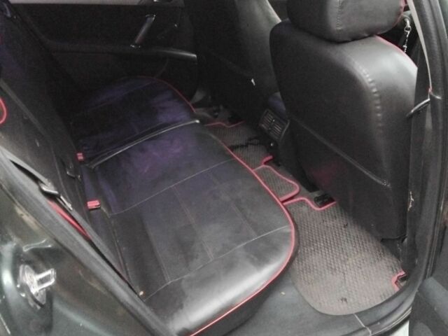 Зеленый Пежо 407, объемом двигателя 1.7 л и пробегом 356 тыс. км за 4600 $, фото 5 на Automoto.ua