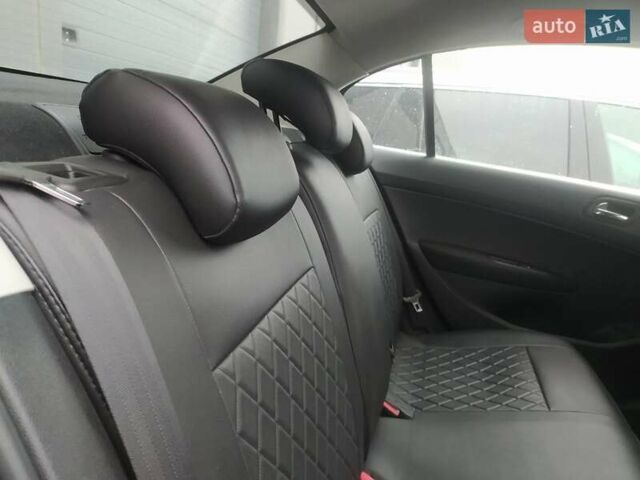 Чорний Пежо 408, об'ємом двигуна 1.6 л та пробігом 187 тис. км за 6800 $, фото 18 на Automoto.ua