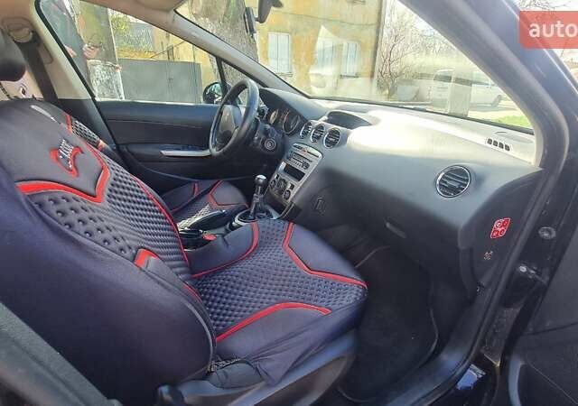 Пежо 408 2013 в Львове на Automoto.ua Черный Пежо 408, объемом двигателя 1.56 л и пробегом 309 тыс. км за 5550 $, фото 10 на Automoto.ua