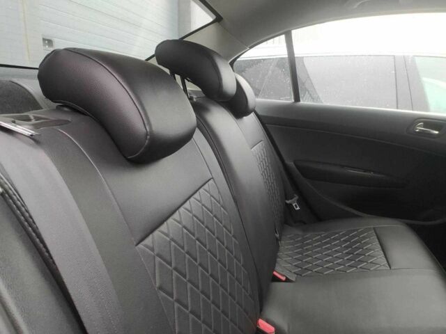 Черный Пежо 408, объемом двигателя 1.6 л и пробегом 187 тыс. км за 6140 $, фото 10 на Automoto.ua