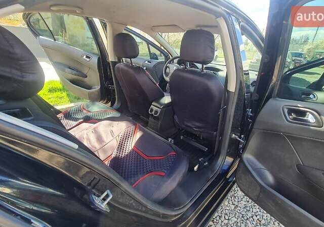 Пежо 408 2013 в Львове на Automoto.ua Черный Пежо 408, объемом двигателя 1.56 л и пробегом 309 тыс. км за 5550 $, фото 9 на Automoto.ua