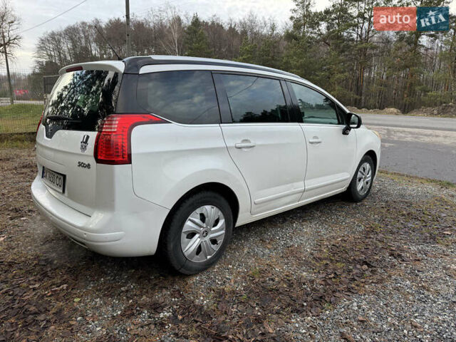Белый Пежо 5008, объемом двигателя 2 л и пробегом 214 тыс. км за 8400 $, фото 12 на Automoto.ua