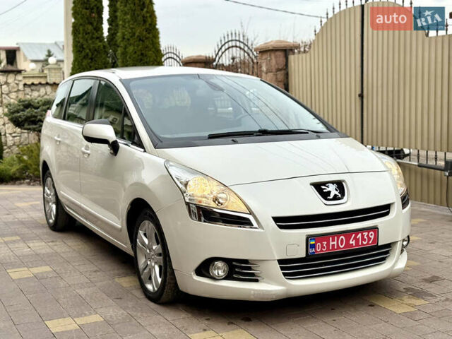 Белый Пежо 5008, объемом двигателя 2 л и пробегом 210 тыс. км за 10848 $, фото 1 на Automoto.ua