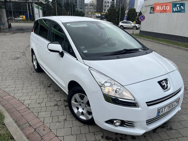 Белый Пежо 5008, объемом двигателя 1.56 л и пробегом 306 тыс. км за 8850 $, фото 1 на Automoto.ua