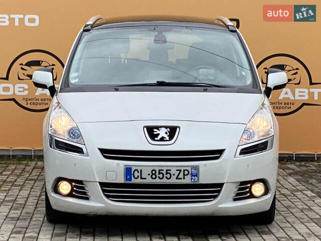Белый Пежо 5008, объемом двигателя 2 л и пробегом 221 тыс. км за 9900 $, фото 1 на Automoto.ua