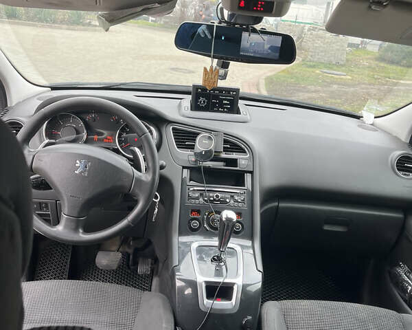 Белый Пежо 5008, объемом двигателя 1.56 л и пробегом 306 тыс. км за 8850 $, фото 8 на Automoto.ua