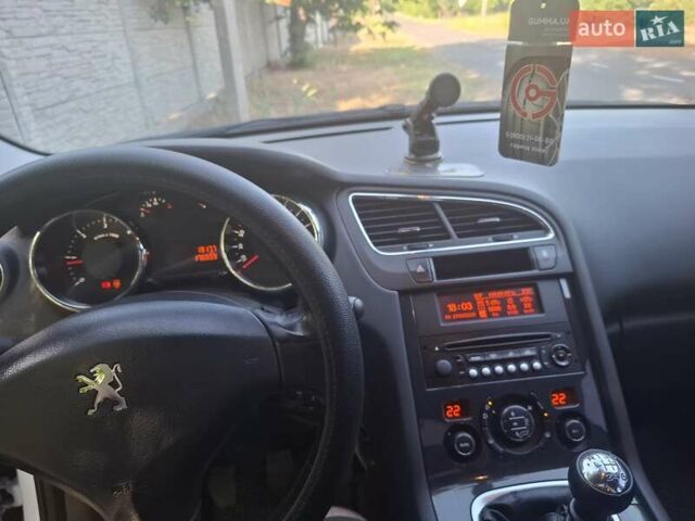 Белый Пежо 5008, объемом двигателя 1.56 л и пробегом 181 тыс. км за 9300 $, фото 5 на Automoto.ua