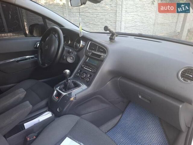 Белый Пежо 5008, объемом двигателя 1.56 л и пробегом 181 тыс. км за 9300 $, фото 10 на Automoto.ua