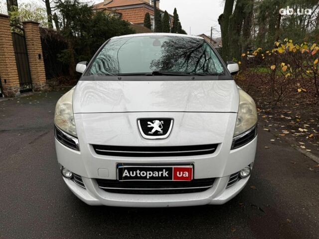 Белый Пежо 5008, объемом двигателя 1.6 л и пробегом 272 тыс. км за 8490 $, фото 1 на Automoto.ua
