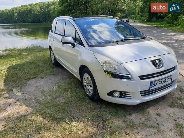 Белый Пежо 5008, объемом двигателя 2 л и пробегом 212 тыс. км за 8500 $, фото 1 на Automoto.ua