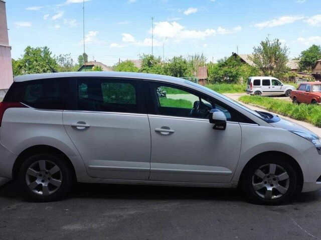 Белый Пежо 5008, объемом двигателя 1.56 л и пробегом 270 тыс. км за 8500 $, фото 1 на Automoto.ua