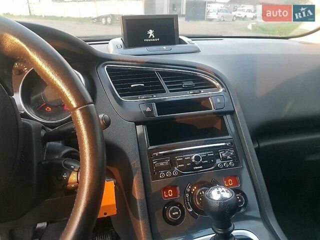 Белый Пежо 5008, объемом двигателя 1.6 л и пробегом 240 тыс. км за 9300 $, фото 6 на Automoto.ua