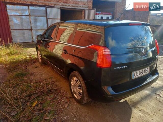Черный Пежо 5008, объемом двигателя 1.56 л и пробегом 295 тыс. км за 7450 $, фото 4 на Automoto.ua