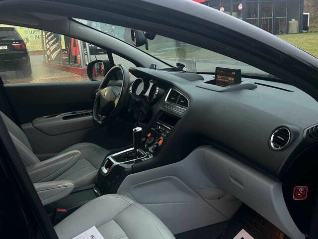 Черный Пежо 5008, объемом двигателя 2 л и пробегом 245 тыс. км за 7739 $, фото 13 на Automoto.ua