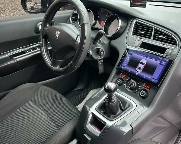 Черный Пежо 5008, объемом двигателя 1.6 л и пробегом 280 тыс. км за 7800 $, фото 15 на Automoto.ua
