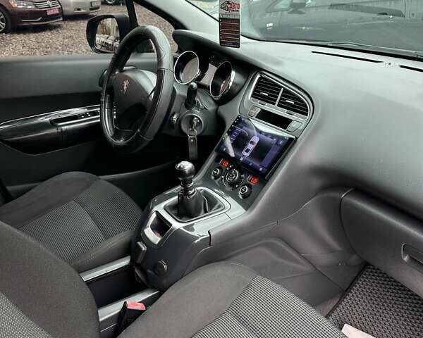 Черный Пежо 5008, объемом двигателя 1.6 л и пробегом 280 тыс. км за 7800 $, фото 12 на Automoto.ua