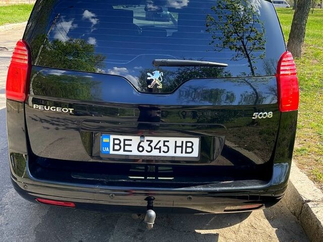Черный Пежо 5008, объемом двигателя 1.6 л и пробегом 287 тыс. км за 8200 $, фото 1 на Automoto.ua