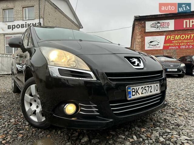 Черный Пежо 5008, объемом двигателя 1.6 л и пробегом 280 тыс. км за 7800 $, фото 11 на Automoto.ua