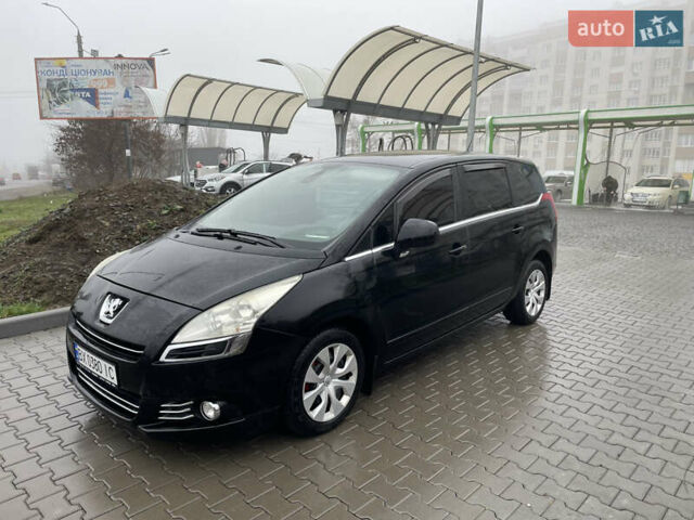 Черный Пежо 5008, объемом двигателя 1.6 л и пробегом 254 тыс. км за 7300 $, фото 5 на Automoto.ua