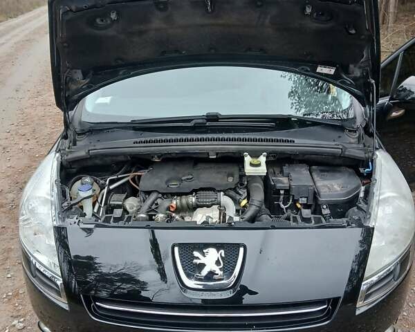Черный Пежо 5008, объемом двигателя 1.56 л и пробегом 123 тыс. км за 7650 $, фото 10 на Automoto.ua