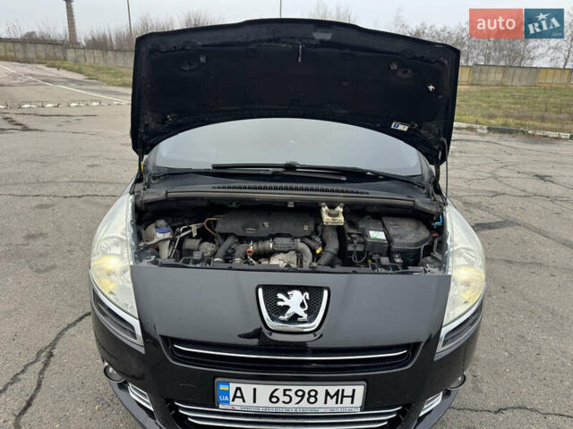 Черный Пежо 5008, объемом двигателя 1.56 л и пробегом 356 тыс. км за 8199 $, фото 16 на Automoto.ua