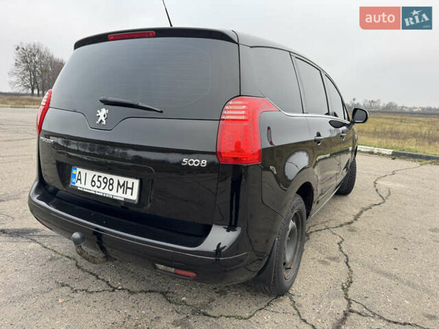 Черный Пежо 5008, объемом двигателя 1.56 л и пробегом 356 тыс. км за 8199 $, фото 4 на Automoto.ua