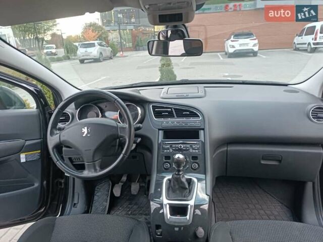 Черный Пежо 5008, объемом двигателя 2 л и пробегом 254 тыс. км за 9600 $, фото 12 на Automoto.ua