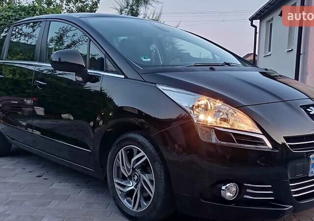 Черный Пежо 5008, объемом двигателя 1.6 л и пробегом 205 тыс. км за 7000 $, фото 1 на Automoto.ua