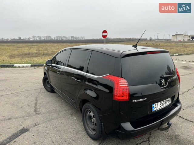 Черный Пежо 5008, объемом двигателя 1.56 л и пробегом 356 тыс. км за 8199 $, фото 7 на Automoto.ua