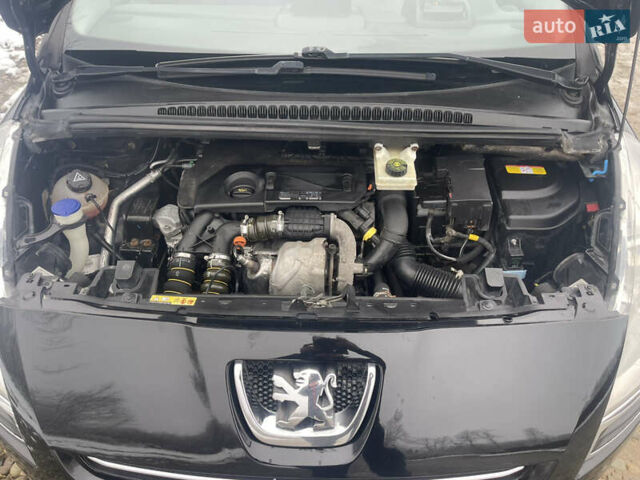 Черный Пежо 5008, объемом двигателя 1.6 л и пробегом 268 тыс. км за 9200 $, фото 12 на Automoto.ua