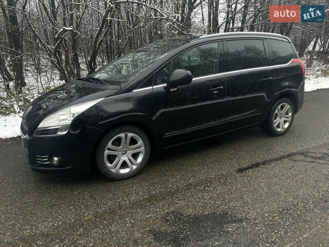 Черный Пежо 5008, объемом двигателя 1.6 л и пробегом 268 тыс. км за 9200 $, фото 1 на Automoto.ua
