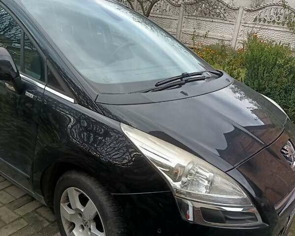 Черный Пежо 5008, объемом двигателя 1.6 л и пробегом 145 тыс. км за 6200 $, фото 3 на Automoto.ua