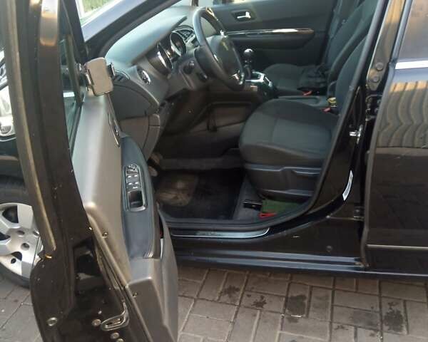 Черный Пежо 5008, объемом двигателя 1.56 л и пробегом 280 тыс. км за 6000 $, фото 6 на Automoto.ua