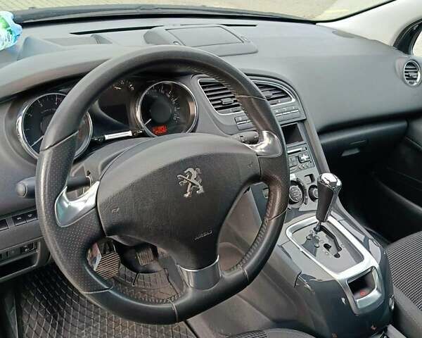 Черный Пежо 5008, объемом двигателя 1.6 л и пробегом 256 тыс. км за 10100 $, фото 7 на Automoto.ua
