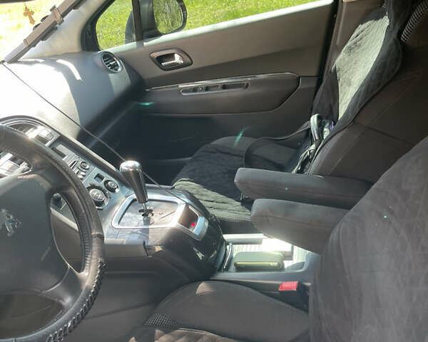 Черный Пежо 5008, объемом двигателя 1.56 л и пробегом 272 тыс. км за 8200 $, фото 14 на Automoto.ua