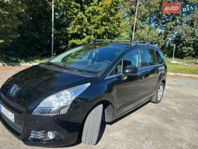 Черный Пежо 5008, объемом двигателя 1.6 л и пробегом 190 тыс. км за 6700 $, фото 5 на Automoto.ua