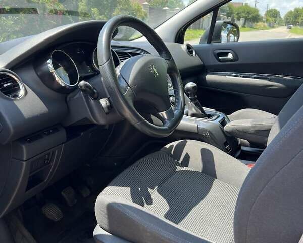 Чорний Пежо 5008, об'ємом двигуна 1.6 л та пробігом 235 тис. км за 8250 $, фото 3 на Automoto.ua