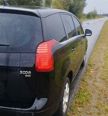 Чорний Пежо 5008, об'ємом двигуна 1.56 л та пробігом 182 тис. км за 10000 $, фото 7 на Automoto.ua
