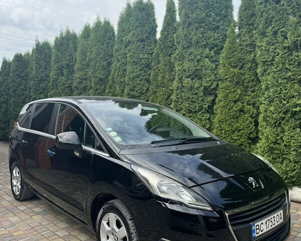 Черный Пежо 5008, объемом двигателя 1.56 л и пробегом 238 тыс. км за 8900 $, фото 1 на Automoto.ua